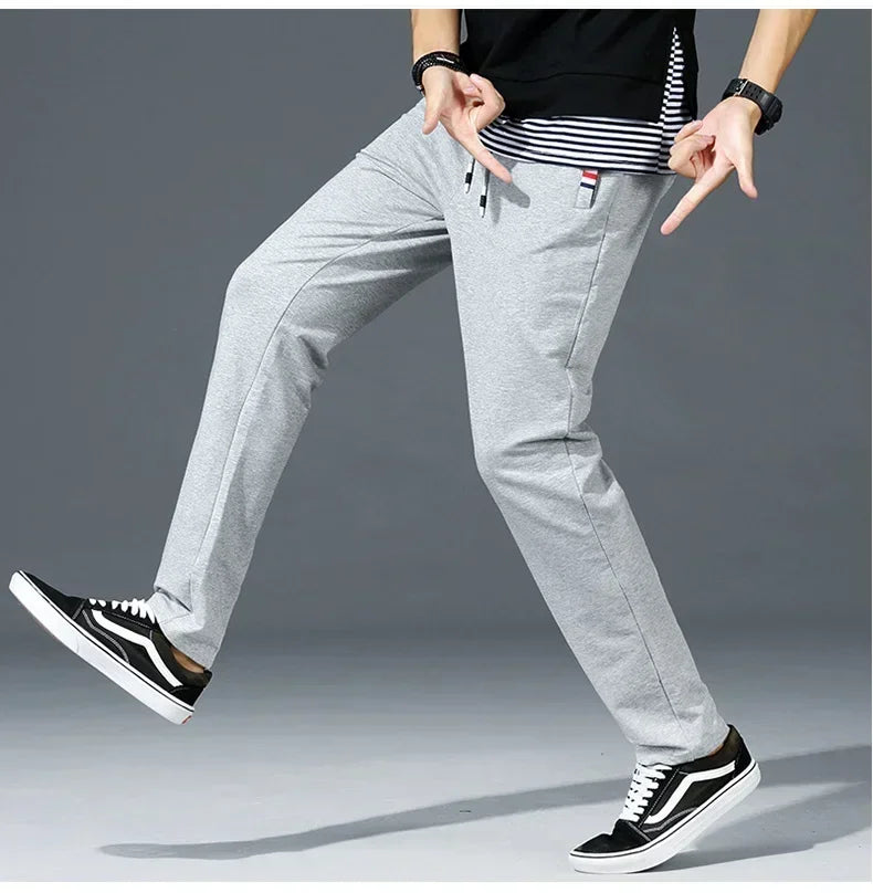 Spring Pants Men Fitness Sportswear Tracksuit Elastic Waist Sweatpants Cotton Trousers Loose Gyms Jogger Track Pants Mens M- 8XL