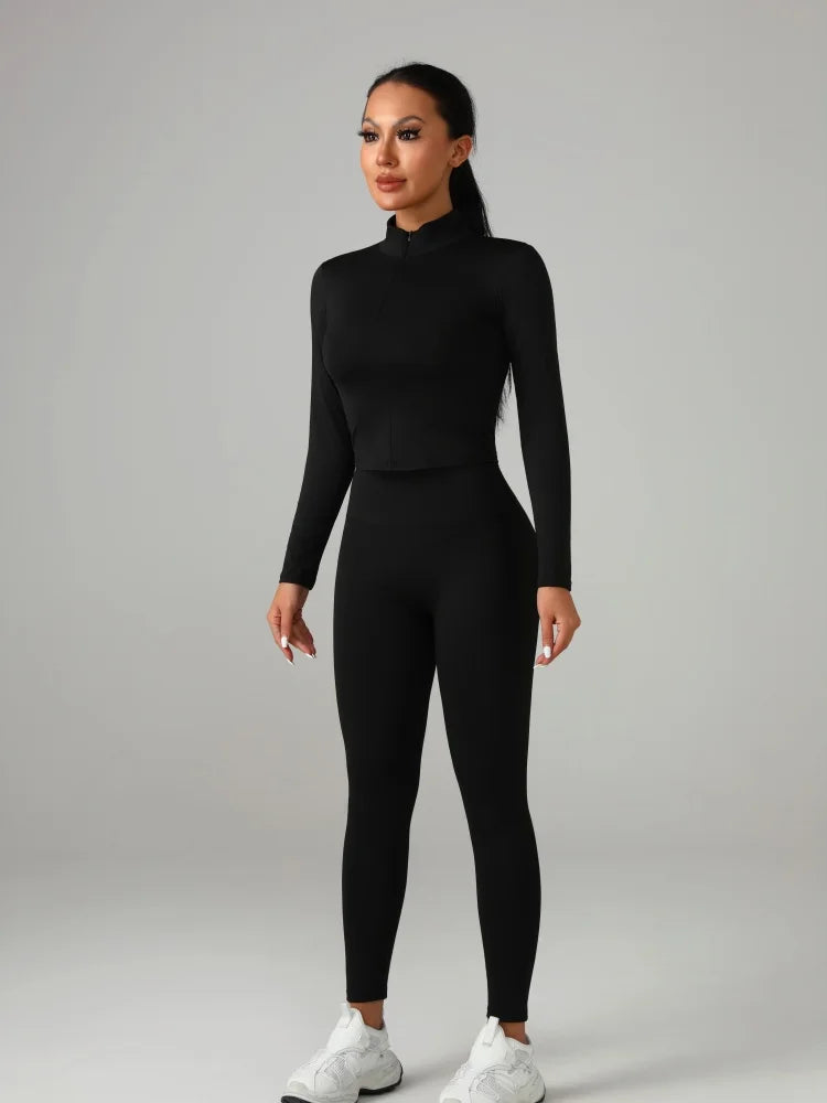 Black and white fitted women's solid-color set, perfect for fashion-conscious ladies and everyday fitness activities.