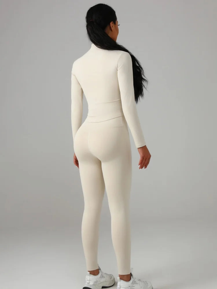 Black and white fitted women's solid-color set, perfect for fashion-conscious ladies and everyday fitness activities.